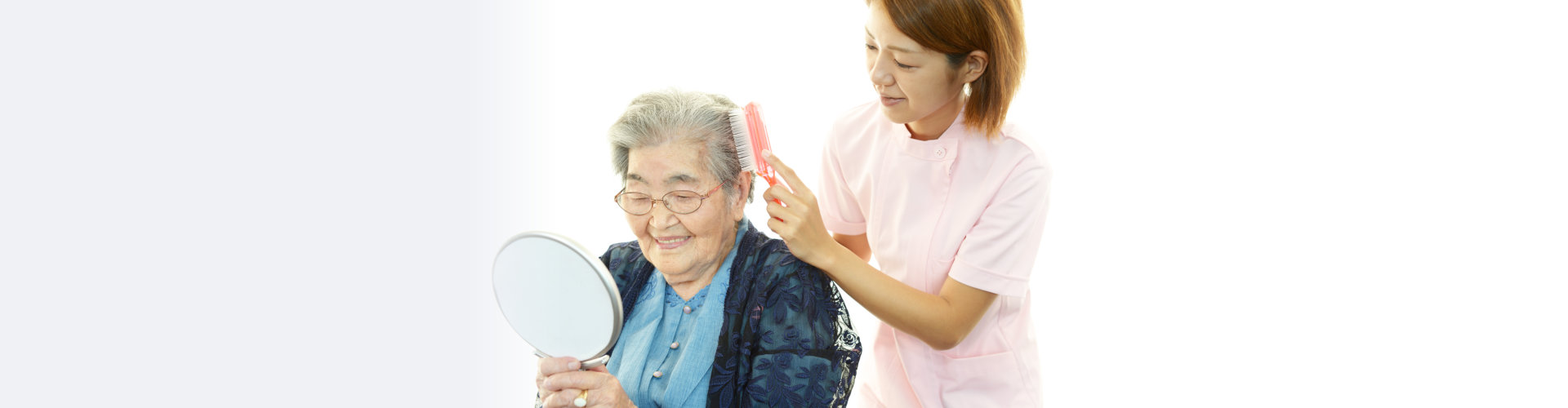 caregiver taking care of the elder woman